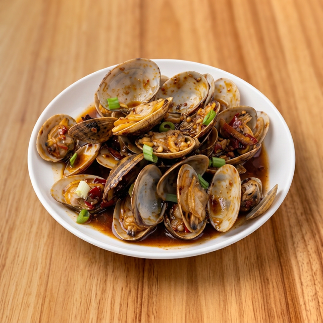 Co4 豉汁炒蜆 Clams in Shell with Black Bean Sauce.